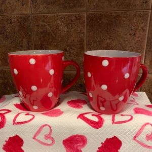 2 red polka dot mugs